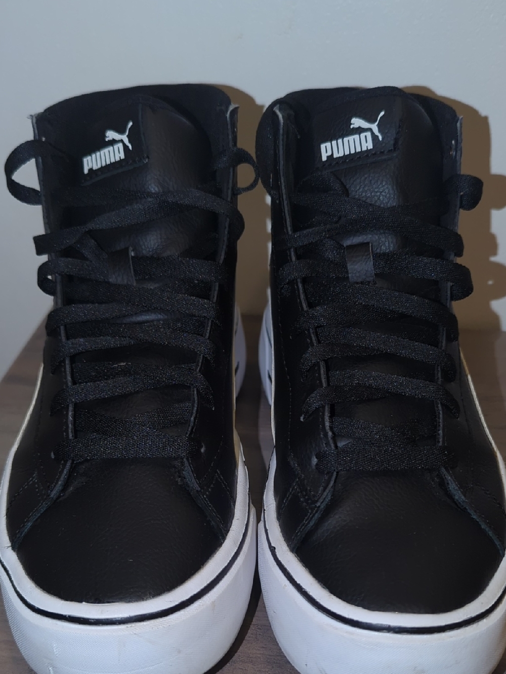 Puma Black and White Mid-Top Sneakers